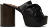 PUSHBUTTON BLACK RIBBON PLATFORM HEELS