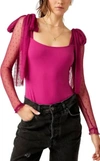 FREE PEOPLE TONQUE TIED SHEER SLEEVE BODYSUIT IN MAGENTA