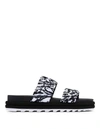 Sorel Roaming Two Strap Sandal In Black/white In Multi