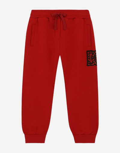 Dolce & Gabbana Jersey Jogging Pants With Logo Patch In レッド