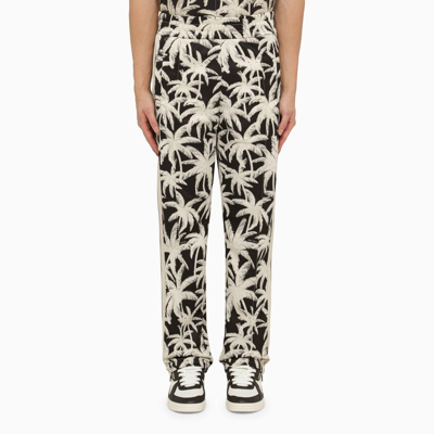 Palm Angels Palm Print Jogging Trousers Men In Black