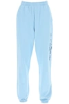 SPORTY AND RICH 'NY HEALTH CLUB' FLOCKED SWEATPANTS