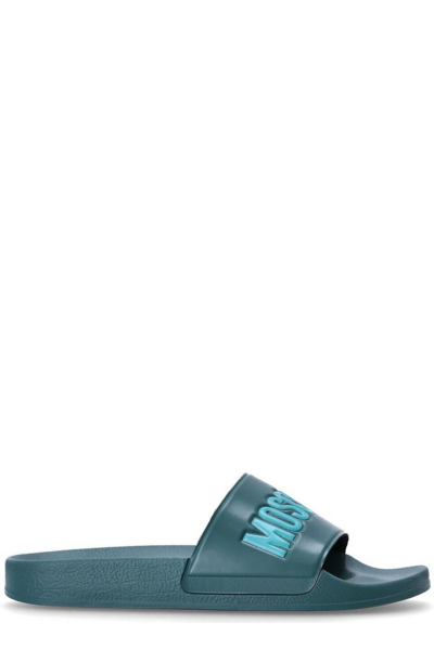 Moschino Logo Embossed Slip In Blue
