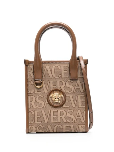 Versace Small  Allover Tote Bag In Brown