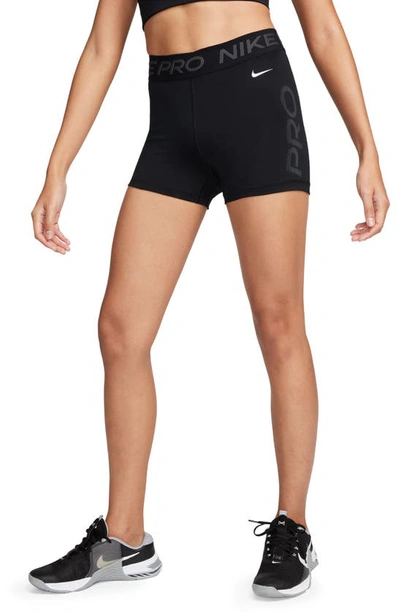 Nike Women's Pro Mid-rise Elastic-waist Graphic Shorts In Black