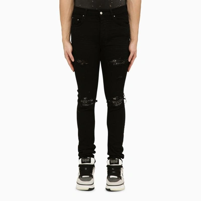 Amiri Skinny Jeans With Camouflage Patches In Black