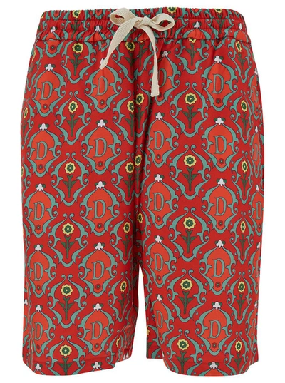 DRÔLE DE MONSIEUR RED SHORTS WITH ALL-OVER ORNEMENTS PRINT IN SATRIN MAN