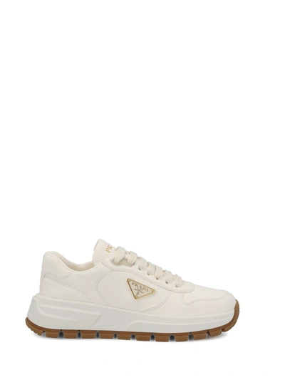 Prada Leather Logo Runner Sneakers In Ivory