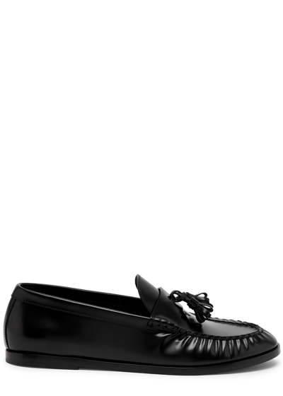 The Row Flat Sole Leather Loafers Featuring Tassel Detail In Black
