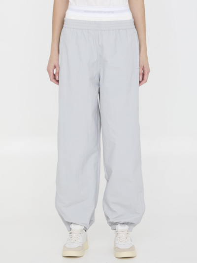ALEXANDER WANG TRACK PANTS WITH PRE-STYLED UNDERWEAR