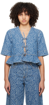 Ganni Tie-detailed Jacquard-denim Peplum Top In 566 Mid Blue Stone