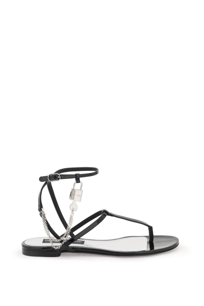 Dolce & Gabbana Patent Leather Thong Sandals With Padlock In Black