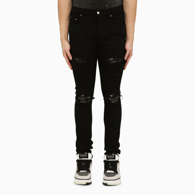 Amiri Skinny Jeans With Camouflage Patches In Black