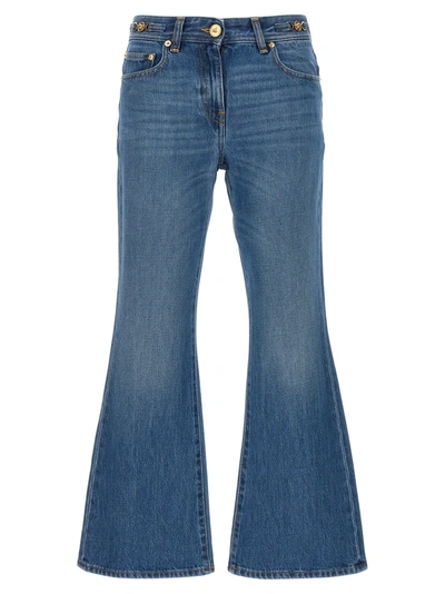 Versace Logo Plaque Flared Jeans In Blu