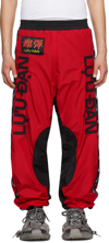 LU'U DAN RED & BLACK SHELL SWEATPANTS