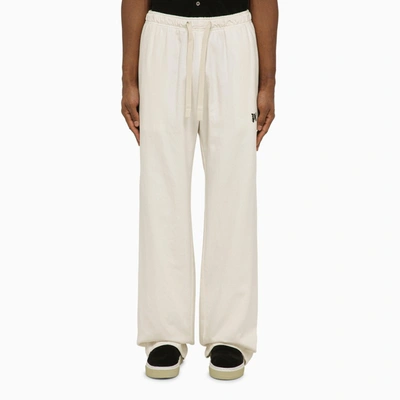PALM ANGELS PALM ANGELS OFF-WHITE JOGGING TROUSERS WITH MONOGRAM