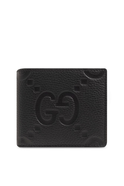 Gucci Logo Embossed Bifold Wallet In Black