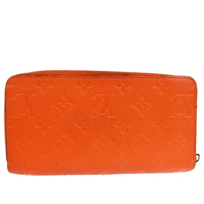 Pre-owned Louis Vuitton Zippy Leather Wallet () In Orange