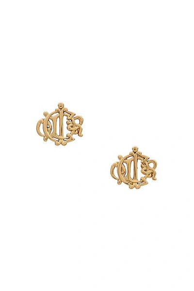 Dior Emblem Logo Earrings In Light Gold