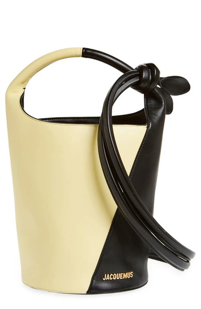 Jacquemus Le Petit Tourni Leather Bucket Bag In Pale Yellow/ Black 9bc