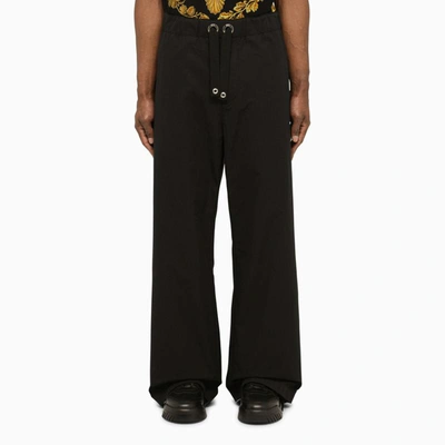 Versace Drawstring Waistband Trousers In Black