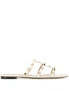 Valentino Garavani Rockstud Flat Sandals In Bronze