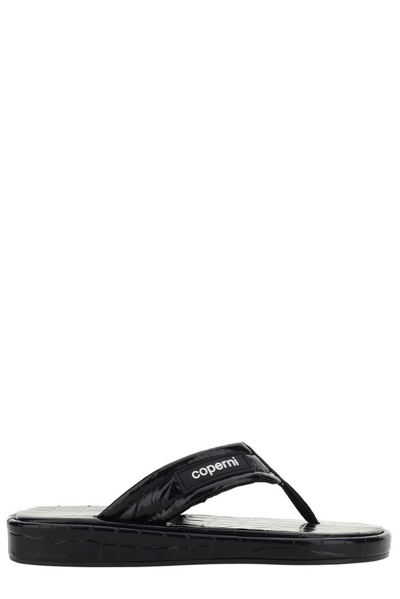 Coperni Logo-embossed Flip Flops In Black
