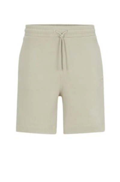 Hugo Boss Cotton-terry Regular-fit Shorts With Logo Badge In Light Beige