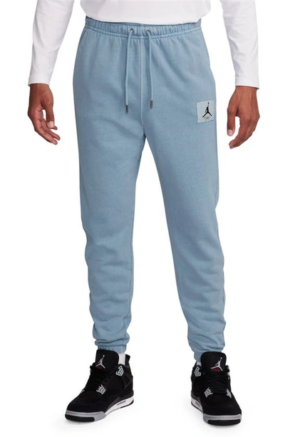 Jordan Flight Essentials Washed Cotton Fleece Sweatpants In Blue