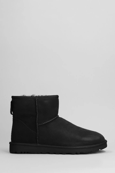 UGG UGG CLASSIC MINI LOW HEELS ANKLE BOOTS IN BLACK SUEDE