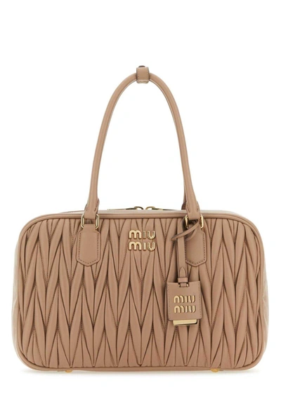 Miu Miu Matelass? Logo Plaque Zipped Tote Bag In Brown