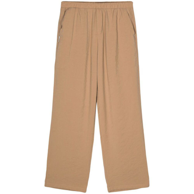 Family First Trousers In Brown