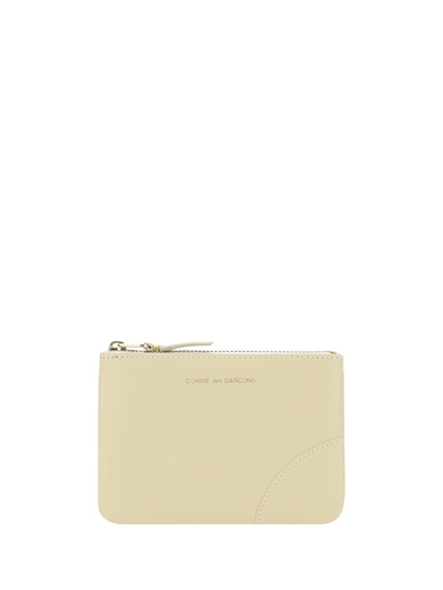 Comme Des Garçons Wallet Logo Printed Zipped Cardholder In Beige