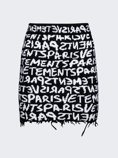 VETEMENTS GRAFFITI MONOGRAM MINI SKIRT