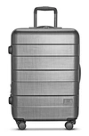SOLO NEW YORK RE:SERVE CHECK-IN SPINNER LUGGAGE