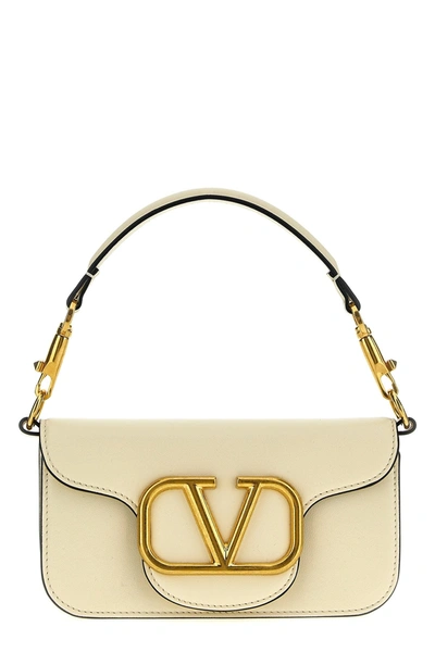 Valentino Garavani Locò Leather Shoulder Bag In Cream
