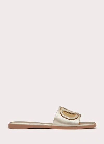 Valentino Garavani Gold Vlogo Cutout Laminated Nappa Leather Sandals In Platinum Antique Brass