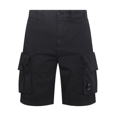 C.p. Company Straight Cut Knee Length Cargo Bermuda Shorts In Black