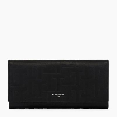 Le Tanneur Emilie Flap Closure Travel Companion In Embossed T Leather In Black