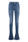 Dolce & Gabbana Destroyed Skinny Jeans With Engraved Metal Accents In Denim