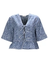 Ganni Tie-detailed Jacquard-denim Peplum Top In Mid Blue Stone