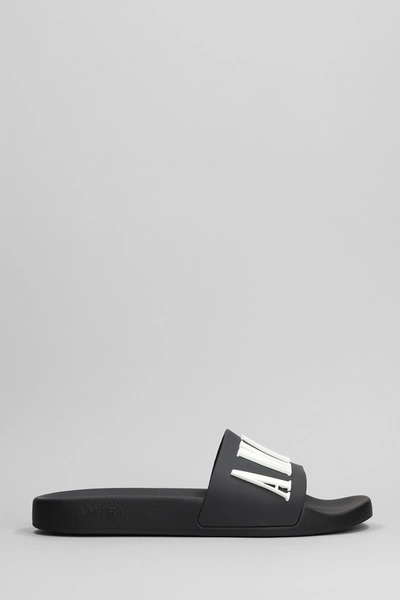 Amiri Brand-embossed Rubber Sliders In Black