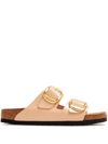 Birkenstock Open-toe Slip-on Buckled Leather Sandals In Beige