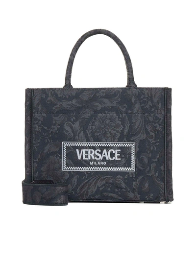 Versace All-over Floral Motif Top Handle Bag In Black