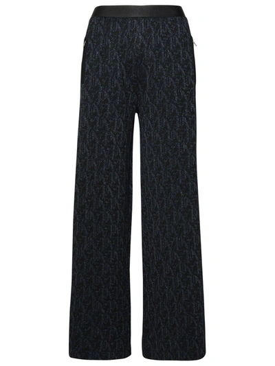 PALM ANGELS PALM ANGELS MONOGRAM-JACQUARD SIDE STRIPE DETAILED TROUSERS