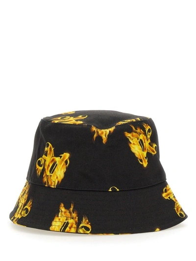Palm Angels Monogram Printed Bucket Hat In Black Gold