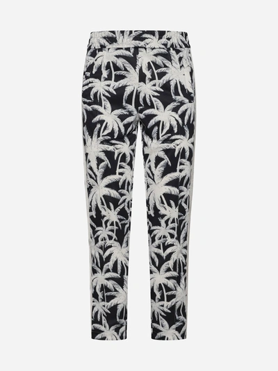 Palm Angels All-over Palms Print Track Pants In Nero