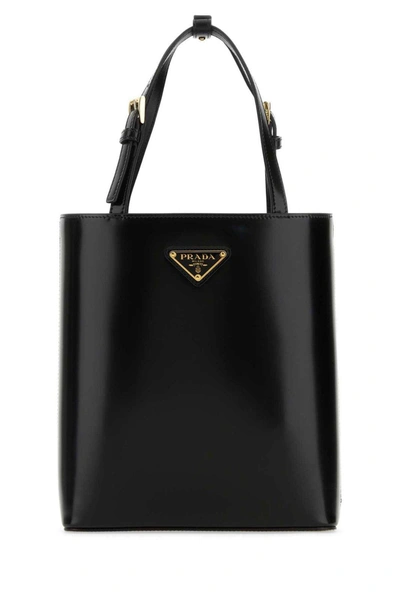 Prada Triangle Logo Plaque Cylinder Shaped Tote Bag In Nero