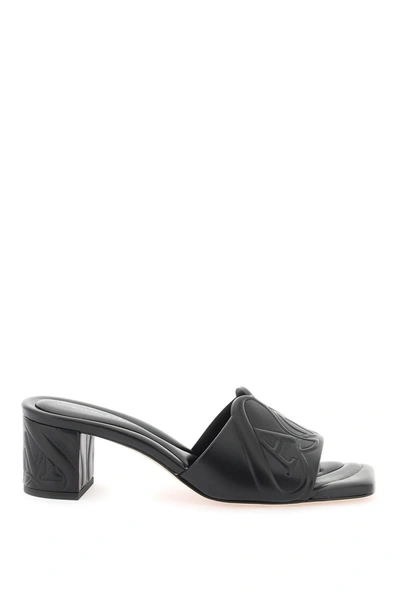 Alexander Mcqueen Embossed Logo Leather Mules In Black