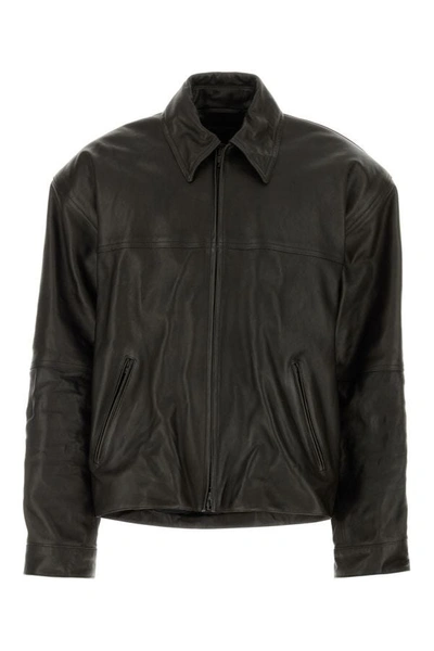 Balenciaga Cocoon Kick Oversized Logo-debossed Leather Jacket In Brown